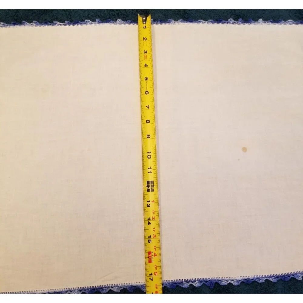 vintage handmade floral needlework table runner with a crocheted border